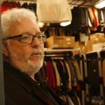 Theater and film department chair Ron Shields opens the door to what he calls the "Taj Mahal" of costume shops. Photo by Sara Shipley Hiles.