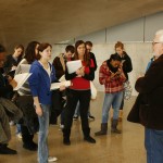 Ron Shields speaks to students in the Wolfe Center lobby.