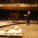 Ron Shields demonstrates the acoustics in the 400-seat Donnell Theatre.